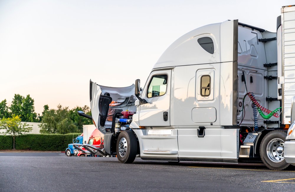 White,bonnet,big,rig,semi,truck,with,open,hood,for